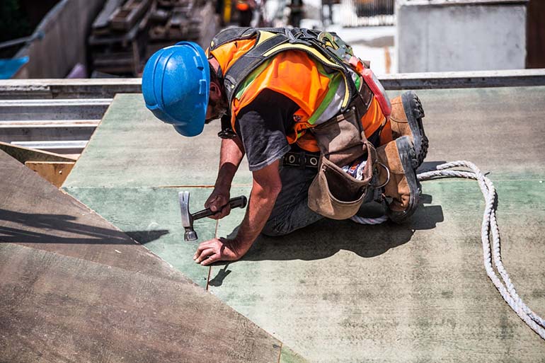 construction worker on roof