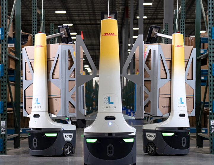 A fleet of Locus autonomous mobile robots at a DHL warehouse.