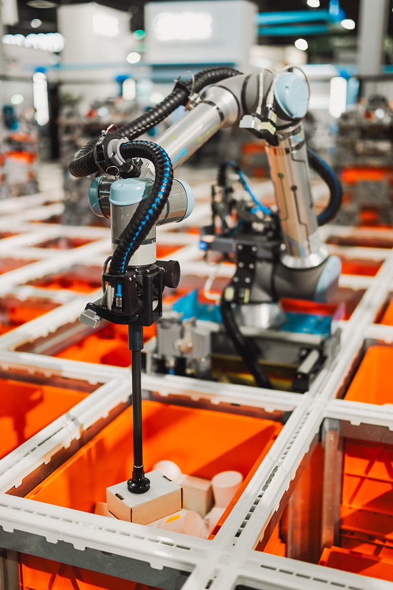 The Ocado on-grid Robotic Pick system includes vision-guided cobot arms.