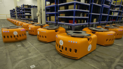 Kiva's pioneering mobile robots and mini shelves in a warehouse, and its creators will be inducted into the Logistics Hall of Fame.