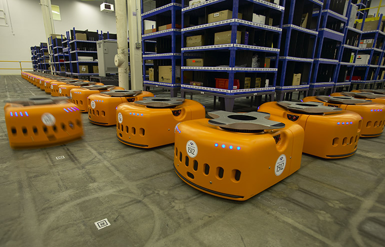 Kiva's pioneering mobile robots and mini shelves in a warehouse, and its creators will be inducted into the Logistics Hall of Fame.