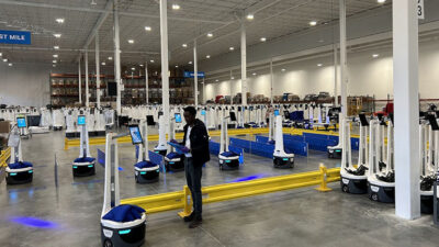 Locus Robotics, which celebrated 4 billion picks, tests Locus Origin AMRs at its new headquarters in Wilmington, Mass.