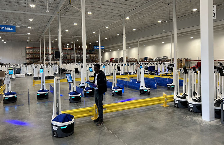 Locus Robotics, which celebrated 4 billion picks, tests Locus Origin AMRs at its new headquarters in Wilmington, Mass.
