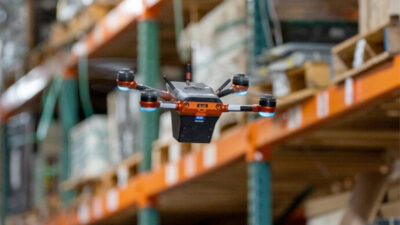 corvus one drone flies through a warehouse while counting inventory as it does for MSI.