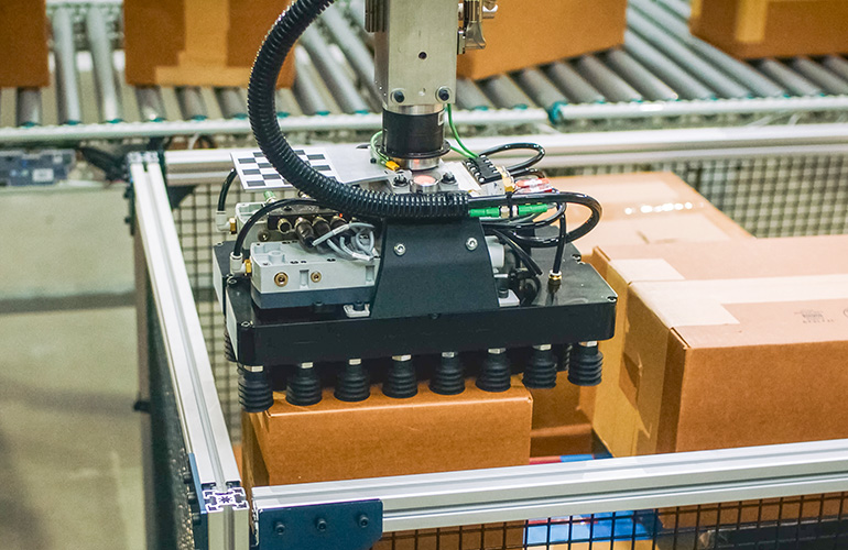 Close up of the ambistack multi-port gripper.