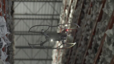 A Gather AI drone flying through a warehouse.