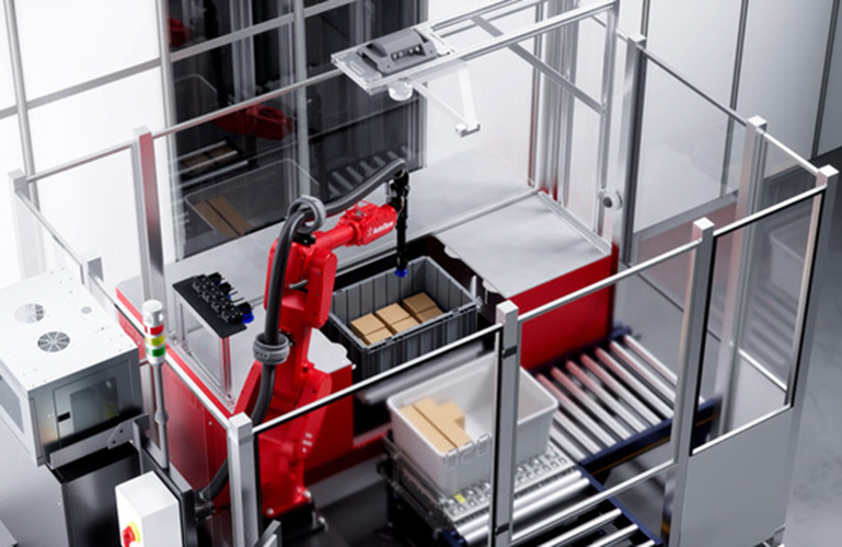 a six axis robot arm picks an item from a tote at a picking station.