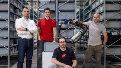 Brightpick's co-founders, from left to right: Branislav Pulis, the Chief Revenue Officer, Jan Zizka, the CEO, Tomas Kovacovsky, the Chief Technology Officer, and Michal Maly, the Head of AI, with Brightpick's Autopicker.