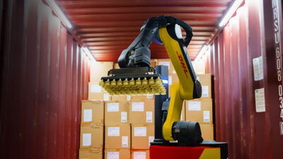 Stretch from Boston Dynamics unloads boxes and cases from trailers for DHL Supply Chain
