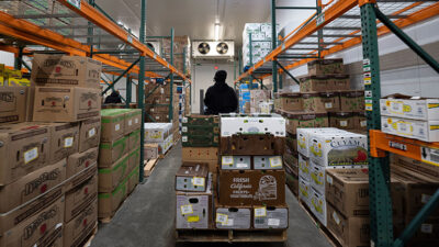 A pallet truck in a warehouse. Dynamic Pallet Builder is designed to help warehouses optimize pallet building, says Lucas Systems.
