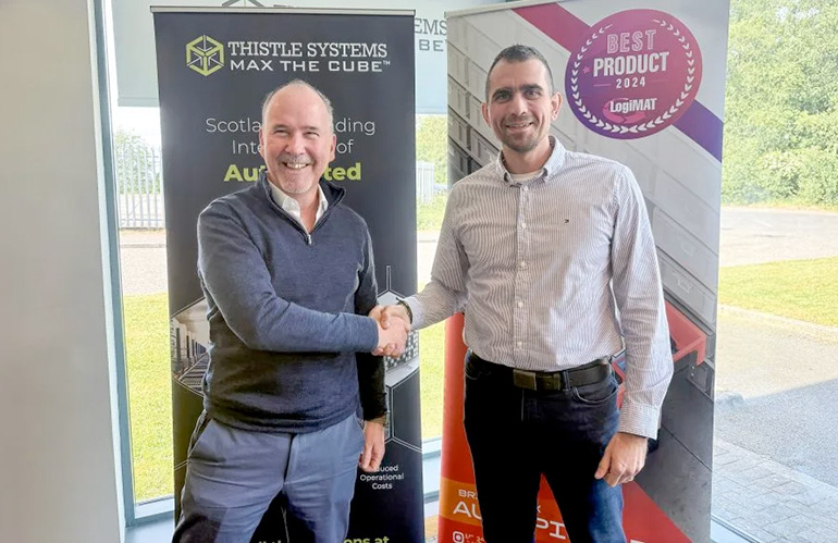 Mike Cairns, CEO of Thistle Systems (left) shakes hands with Branislav Pulis, Chief Revenue Officer at Brightpick (right).