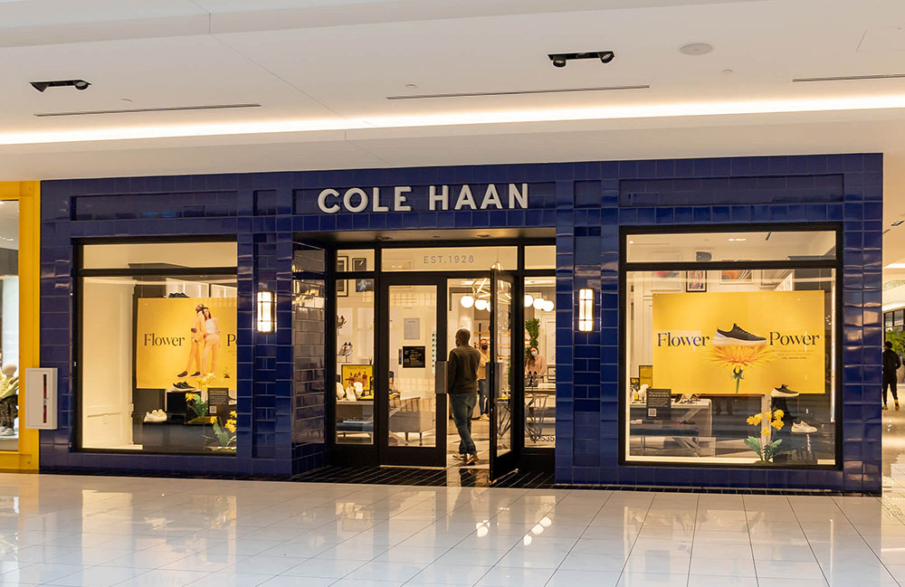 A Cole Haan storefront in a mall.