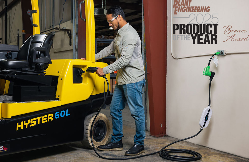 A person plugging in a Hyster forklift for charging.
