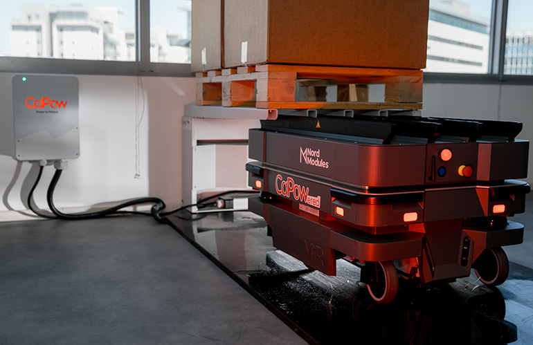 Genesis, shown here, is a modular power platform enabling in-motion energy transfer for industrial mobile robots from CaPow.