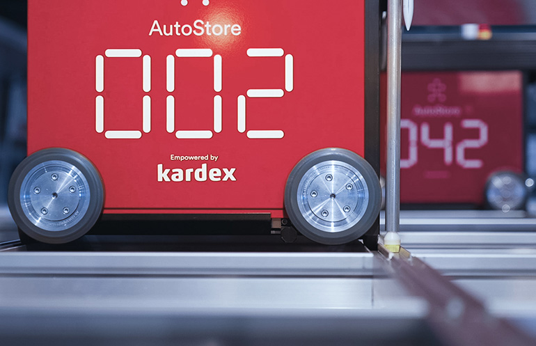 SnapVac from Kardex brushes racking in an AutoStore Grid.