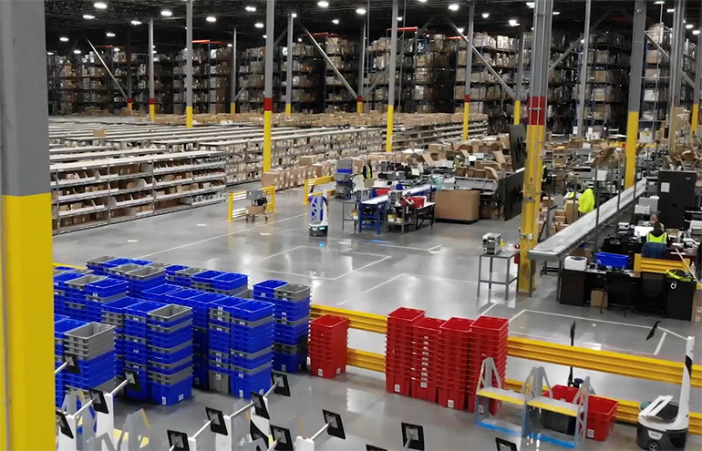 A Kenco e-commerce fulfillment facility in Indiana uses Locus AMRs and other automation.